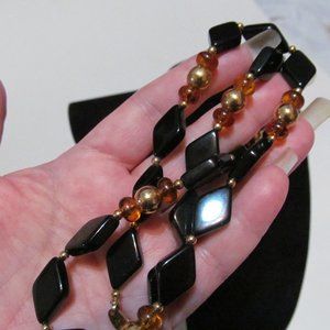Trifari black gold amber bead necklace signed